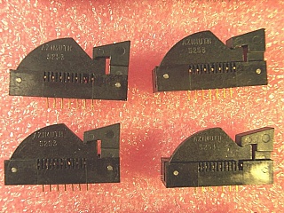 7-pin butterfly terminal/socket with clamp,  to make 7-pin or 14-pin butterfly laser mount. Azimuth P/N: P/N: 5253-100-7-R2. One plastic teeth is missing or heavily bent. `Sell As Is`, `No Return`.
