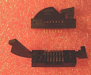 7-pin butterfly terminal/socket with clamp,  to make 7-pin or 14-pin butterfly laser mount. Azimuth P/N: P/N: 5253-100-7-S2. One plastic teeth is missing or heavily bent. `Sell As Is`, `No Return`.