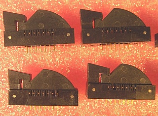 7-pin butterfly terminal/socket with clamp,  to make 7-pin or 14-pin butterfly laser mount. Azimuth P/N: P/N: 5253-100-7-S2. One plastic teeth is missing or heavily bent. `Sell As Is`, `No Return`.