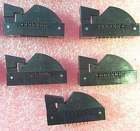 7-pin butterfly terminal/socket with clamp,  to make 7-pin or 14-pin butterfly laser mount. Azimuth P/N: P/N: 5253-100-7-S2. One plastic teeth is missing or heavily bent. `Sell As Is`, `No Return`.