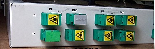 Quad 2x2 optical latching switch. With 16 SC/APC adapters. Antec P/N: LLOS-RM 253348. Verified working well at 1550nm