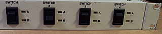 Quad 2x2 optical latching switch. With 16 SC/APC adapters. Antec P/N: LLOS-RM 253348. Verified working well at 1550nm