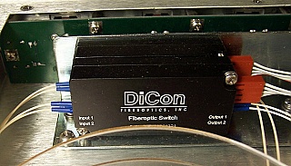 Dual 2x2 optical latching switch. With 8 SC/APC adapters. Antec P/N: 253346 LLOS.  Verified working well at 1550nm