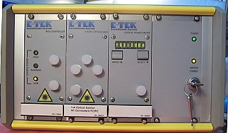 E-tek mainframe with power meter module, and WSS controller module, also a non-working DFB laser 1.55um module. . There is a separate 1x4 1550nm splitter passive module  and you can buy it separately