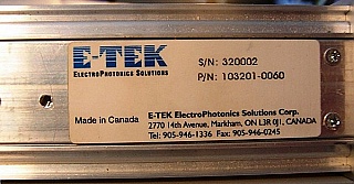E-tek mainframe with power meter module, and WSS controller module, also a non-working DFB laser 1.55um module. . There is a separate 1x4 1550nm splitter passive module  and you can buy it separately