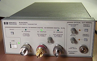 Agilent 83430A 2.5Gb Lightwave transmitter. 1549.8nm, about 1mW DFB laser source.