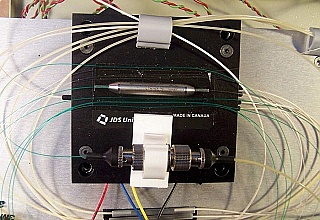 JDS benchtop 1532nm/1557nm DFB laser source, low output power, FC/PC adapter,  DFB laser with single wavelength peak.