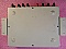 Fiber optic junction box made by Amp. Wall-mount unit with metal case.